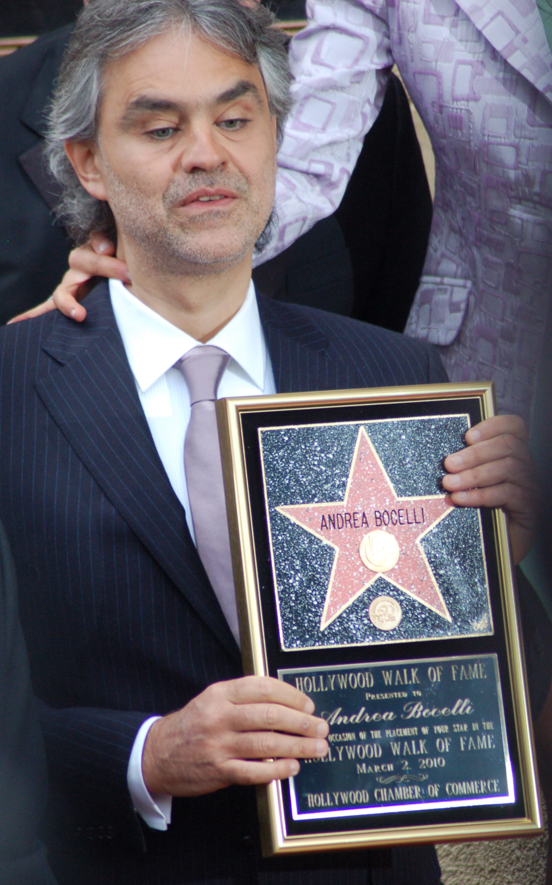 Imagem de referência de Andrea Bocelli, descrito nos dados abertos como tenor italiano